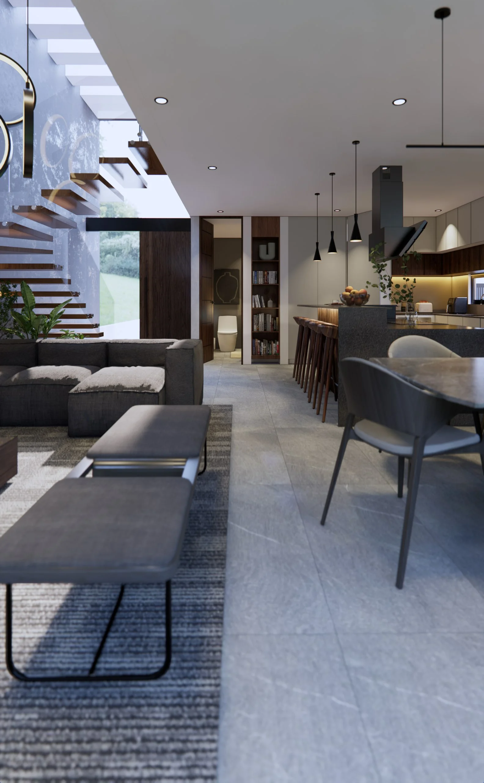 Sala de Casa Grillos a doble altura, con la escalera blanca al fondo