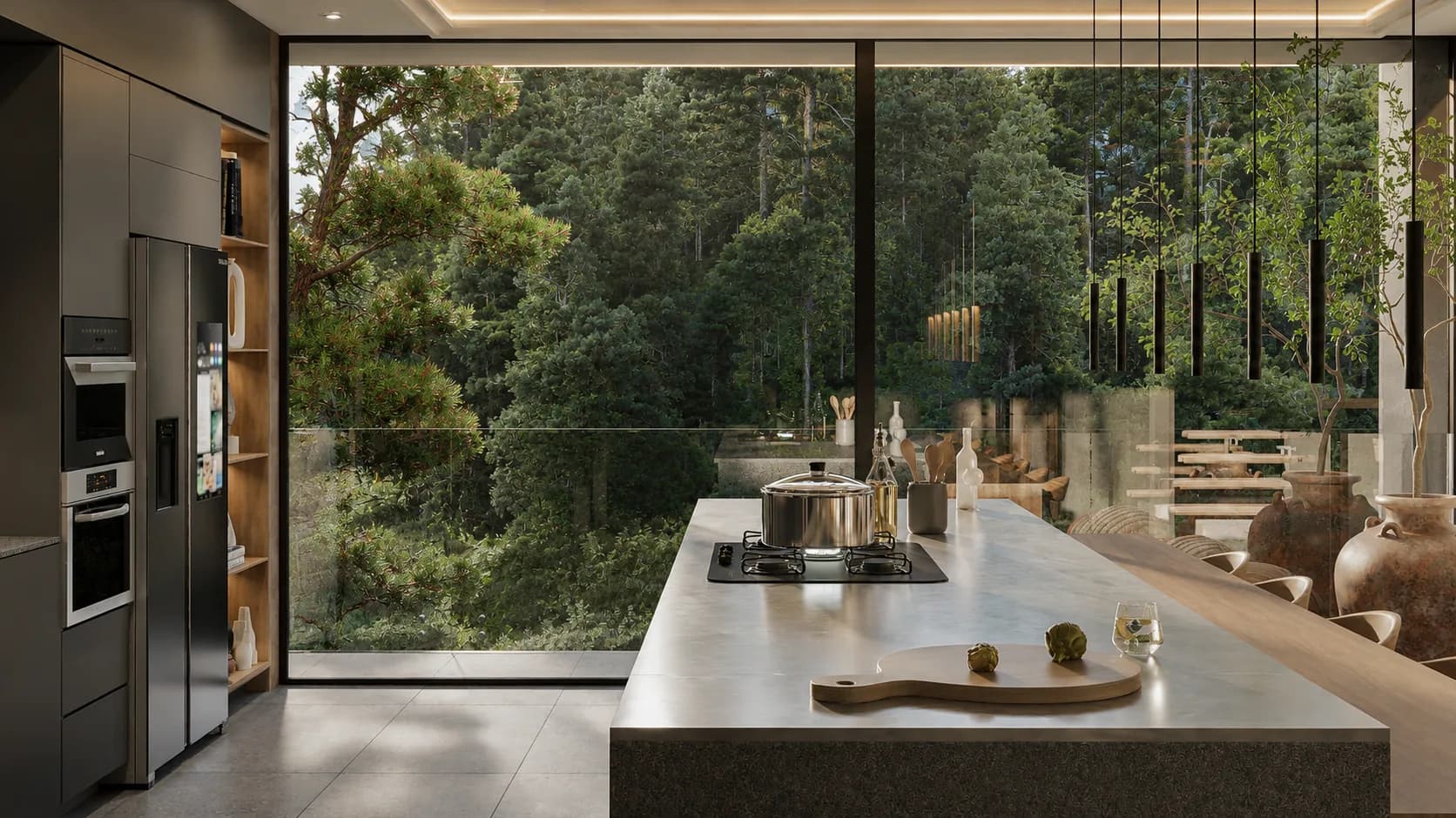 Cocina de la Residencia Monroy con ventanal de piso a techo hacia el bosque