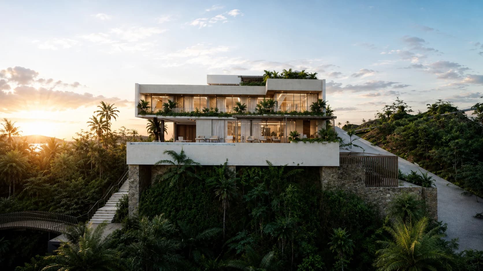 Fachada trasera de la Residencia Quinta Mar al atardecer, abierta al mar