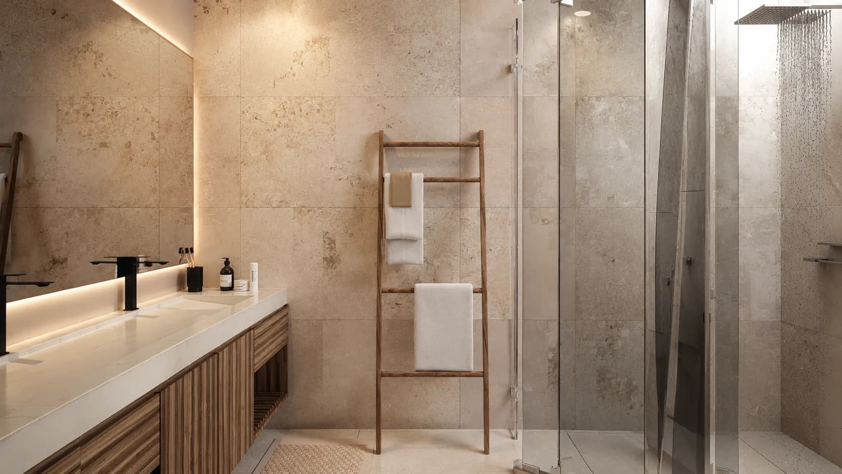 Baño principal de la Residencia Quinta Mar en piedra clara