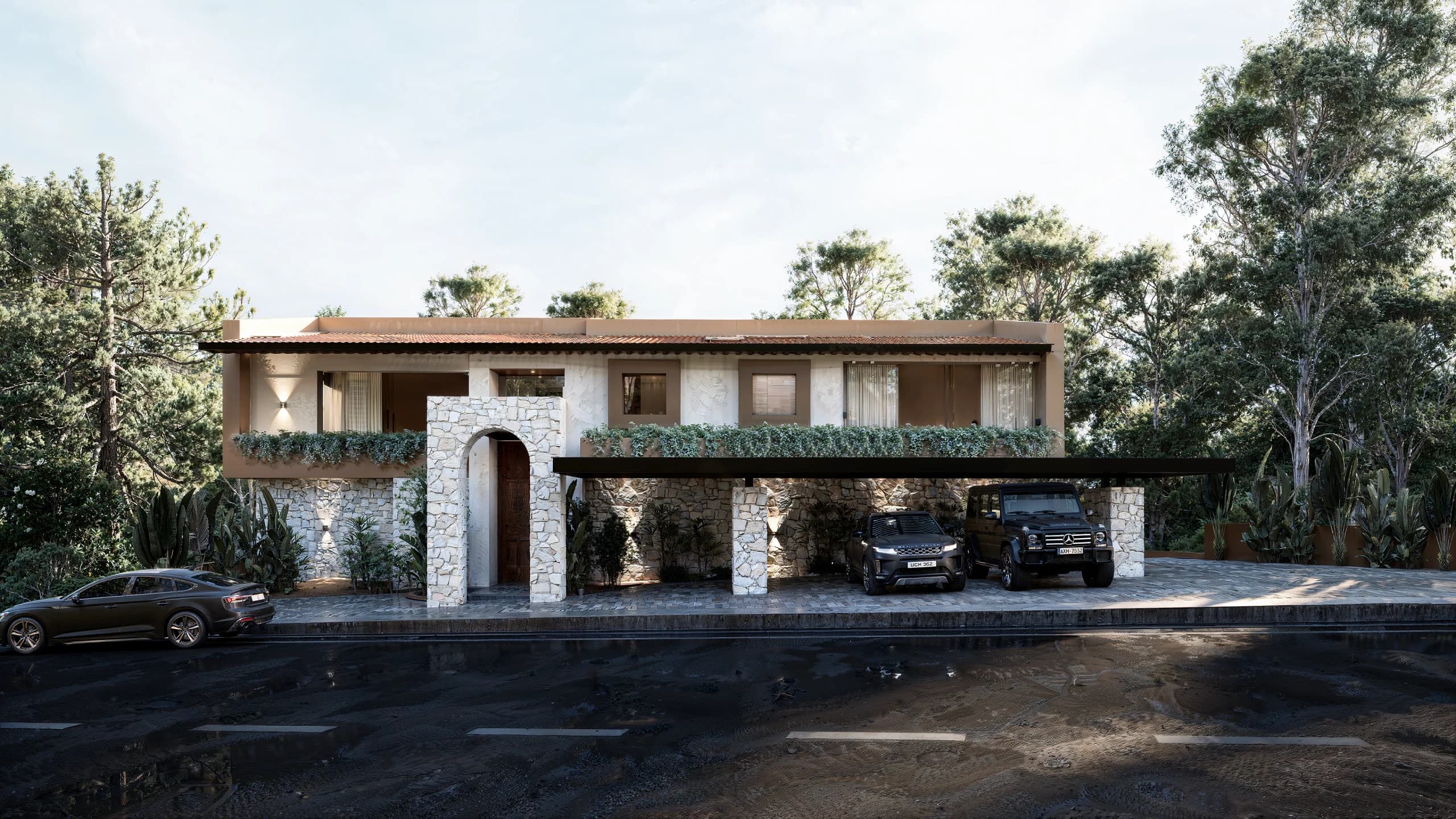 Fachada de la Residencia San Diego desde la calle, con acceso de cantera y los autos